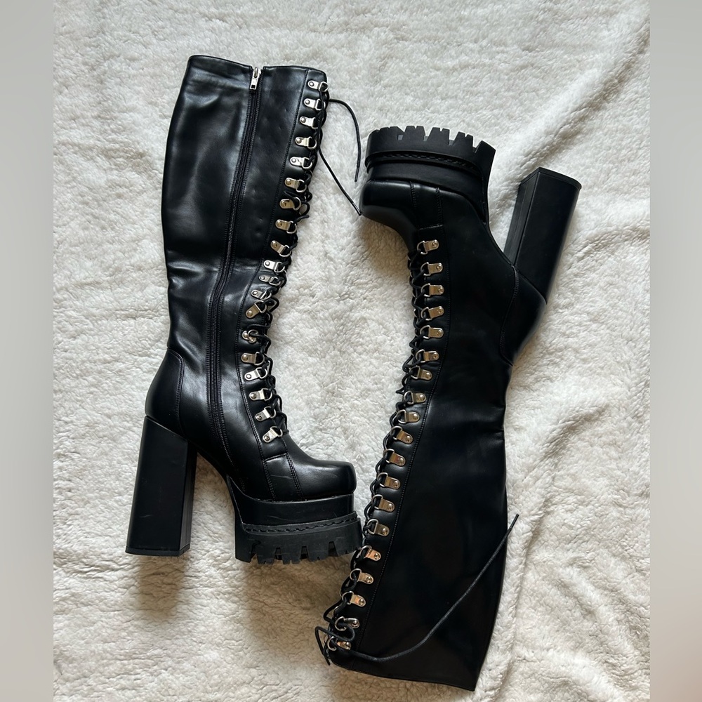 Sleek Black Lace-Up Heeled Boots